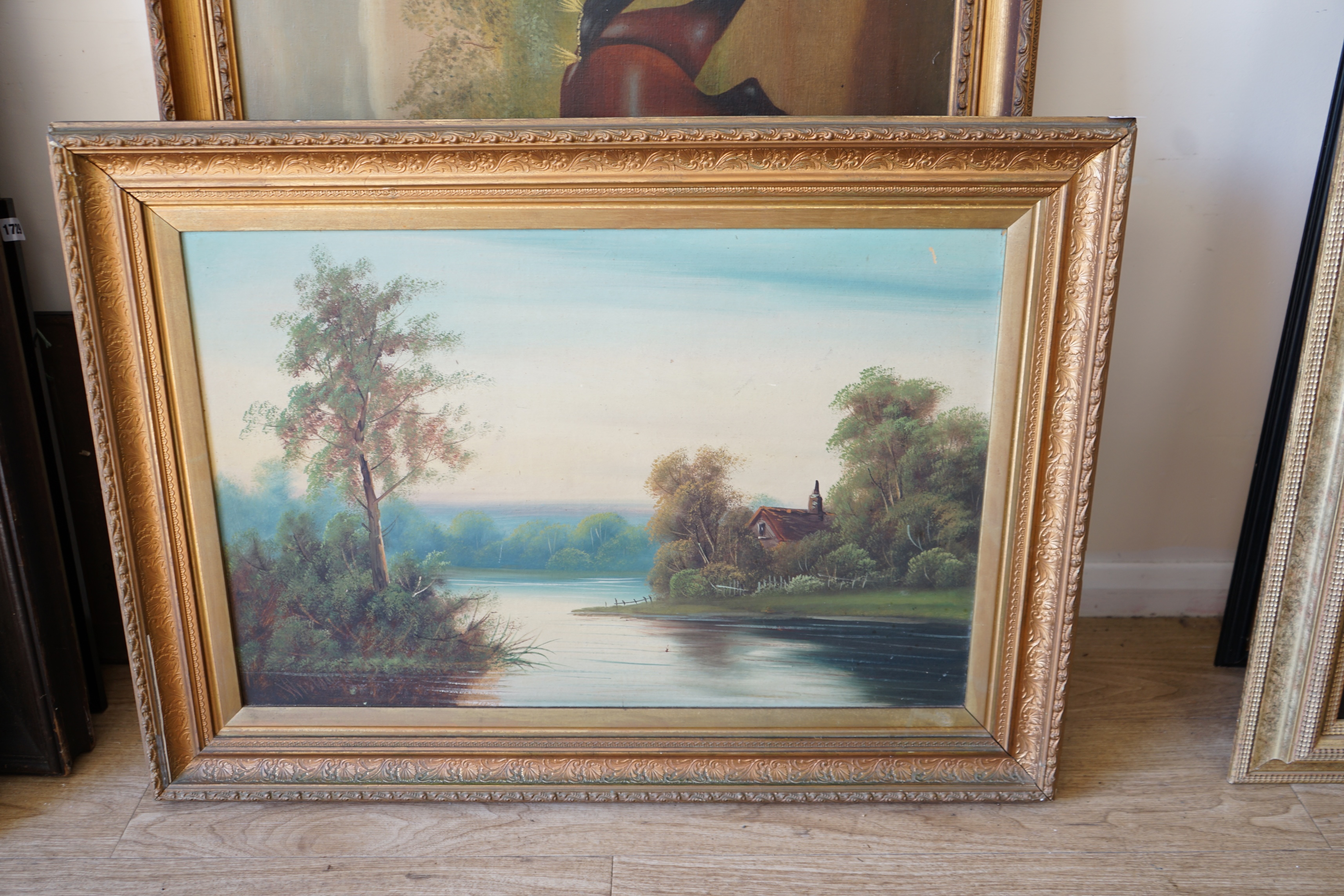 Edwardian School, pair of oils on board, River landscapes, indistinctly signed, 48 x 74cm. Condition - fair